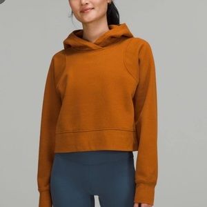 NWT lululemon lounge full cropped hoodie.  Not worn. No rip tag inside.